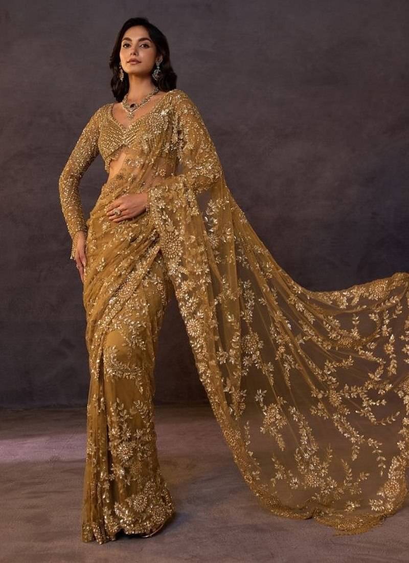 Olive gold butterfly net heavy sequins embroidered saree with embroidered net blouse
