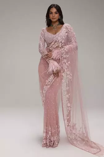 Baby pink butterfly net heavy sequins embroidered saree with embroidered net blouse