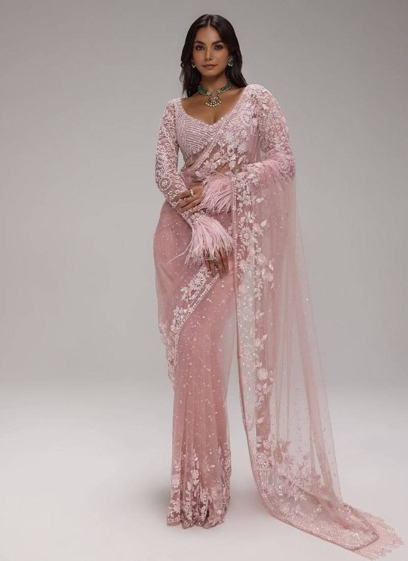 Baby pink butterfly net heavy sequins embroidered saree with embroidered net blouse