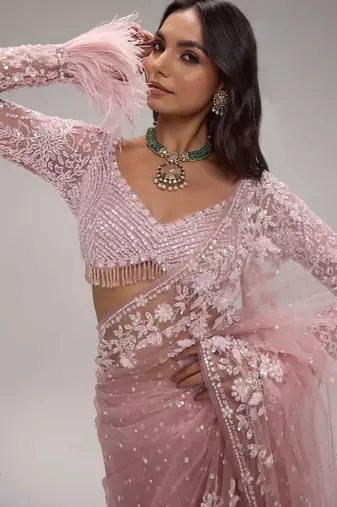 Baby pink butterfly net heavy sequins embroidered saree with embroidered net blouse