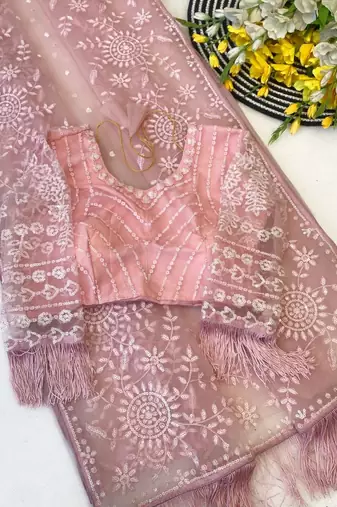 Baby pink butterfly net heavy sequins embroidered saree with embroidered net blouse