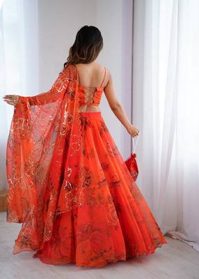 Orange Organza Corset Lehenga Set with Batwa Bag 4