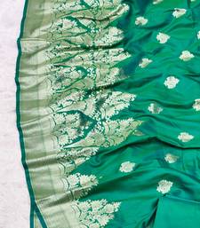 green zari woven banarasi silk blend traditional saree with blouse piece