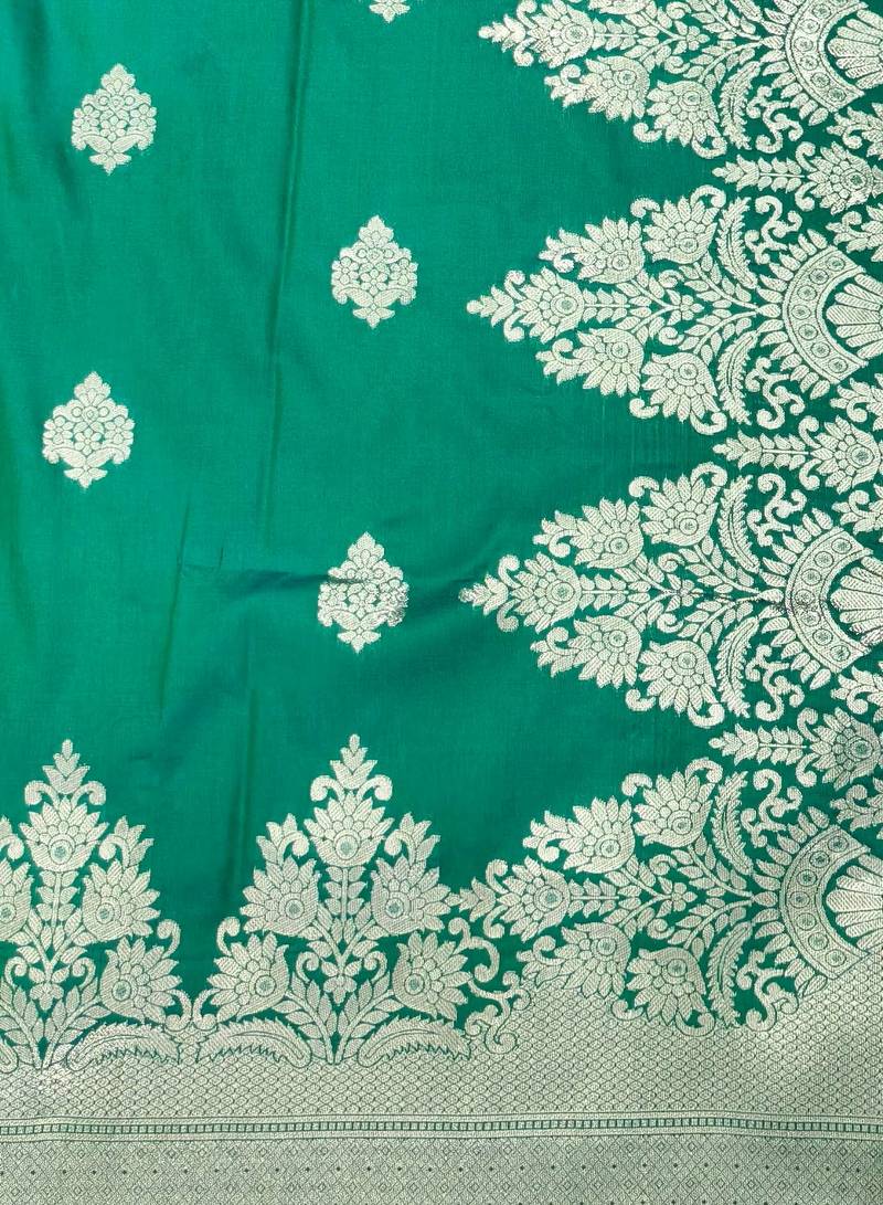 green zari woven banarasi silk blend traditional saree with blouse piece
