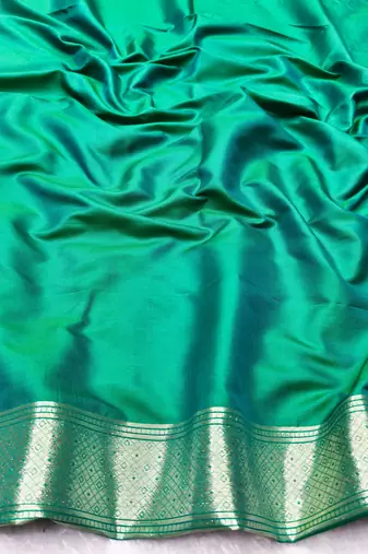 green zari woven banarasi silk blend traditional saree with blouse piece