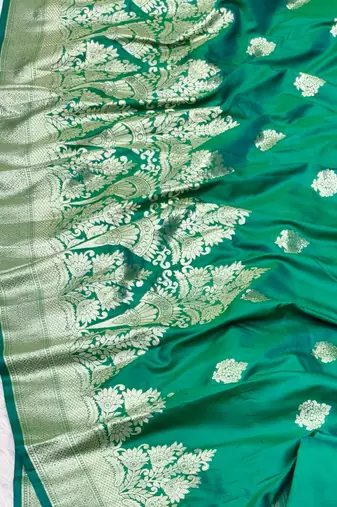 green zari woven banarasi silk blend traditional saree with blouse piece