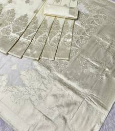 cream zari woven banarasi silk blend traditional saree with blouse piece