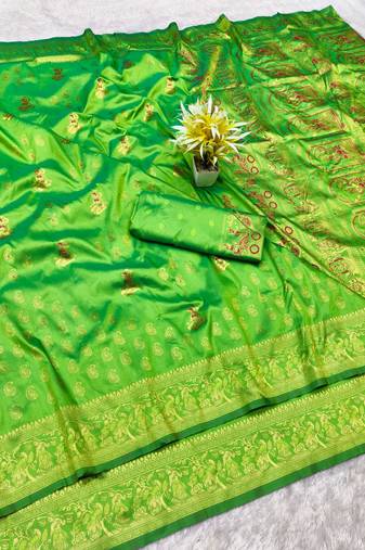 green zari woven baluchari silk blend traditional saree with blouse piece
