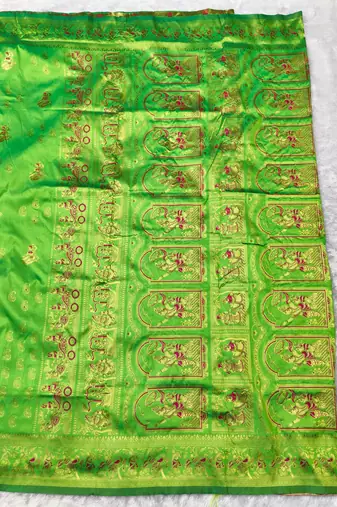 green zari woven baluchari silk blend traditional saree with blouse piece