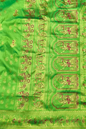 green zari woven baluchari silk blend traditional saree with blouse piece