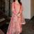 Women peach-coloured floral kurta with trousers & dupatta