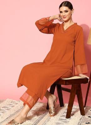 Rust flared sleeve organza detailed v neck textured kurta with palazzo 1