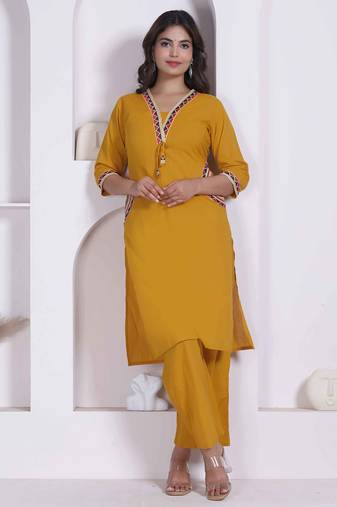 womens yellow kurta and palazzo