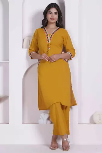 womens yellow kurta and palazzo