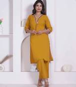womens yellow kurta and palazzo