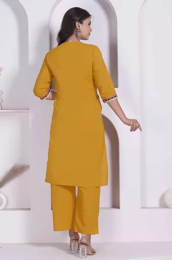 womens yellow kurta and palazzo