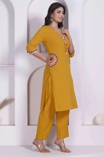 womens yellow kurta and palazzo