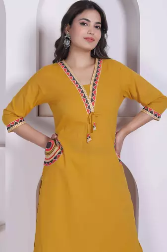 womens yellow kurta and palazzo