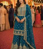 Teal blue embroidered with mirror work heavy georgette free size stiched kurta set with sharara and dupatta