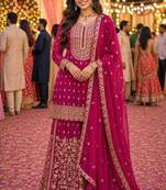 Pink embroidered with mirror work heavy georgette free size stiched kurta set with sharara and dupatta