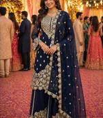 Navy blue embroidered with mirror work heavy georgette free size stiched kurta set with sharara and dupatta