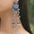 Oxidised Silver Look Multi Layer Long Chain Jhumka Earrings for Women with Artificial Stones