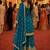 Teal blue embroidered with mirror work heavy georgette free size stiched kurta set with sharara and dupatta