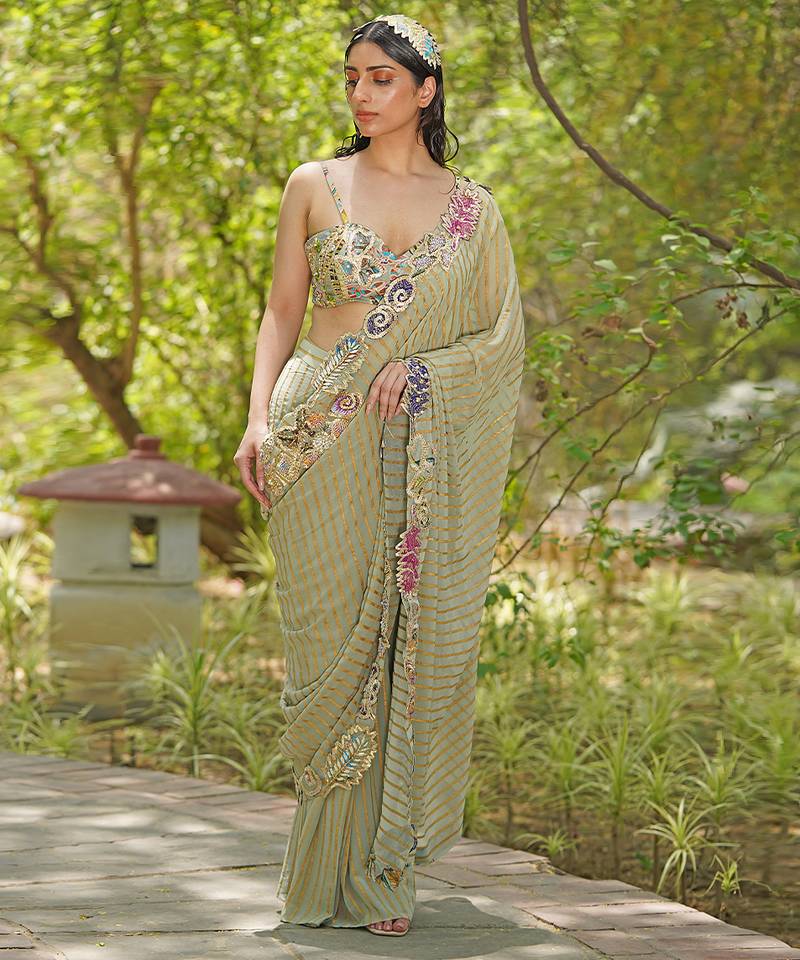 Sage green embroidered georgette drape saree set