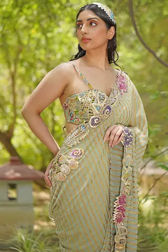 Sage green embroidered georgette drape saree set