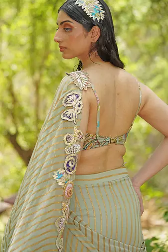 Sage green embroidered georgette drape saree set
