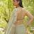Sage green embroidered georgette drape saree set