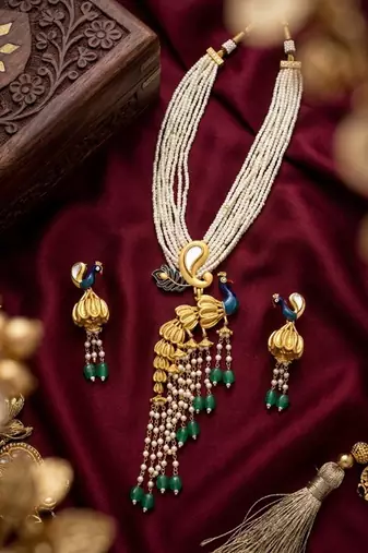 Traditional antique gold plated peacock kundan necklace set with pearl strands & green beads for wedding