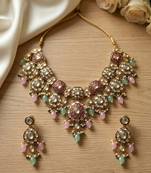 Gold plated kundan choker necklace set with ruby red stones & pearl jhumka earrings for indian wedding bridal wear