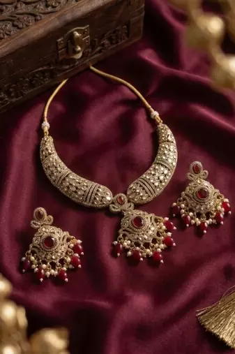 Gold plated kundan choker necklace set with ruby red stones & pearl jhumka earrings for indian wedding bridal wear