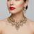 Gold plated kundan necklace set with pastel pink and mint green beads | indian bridal wedding jewelry set with earrings