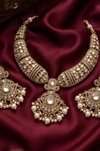 Gold kundan necklace set with pearl drop earrings | traditional bollywood bridal wedding indian jewelry set