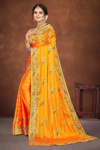 yellow color georgette embroidered saree with un-stitched blouse