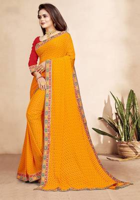 yellow color bandhni print saree with embroidered lace border sarees 2