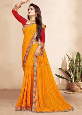 yellow color bandhni print saree with embroidered lace border sarees 3
