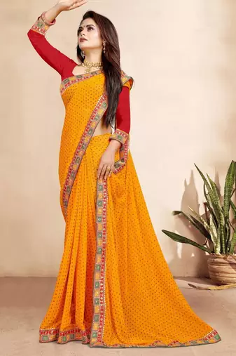 yellow color bandhni print saree with embroidered lace border sarees