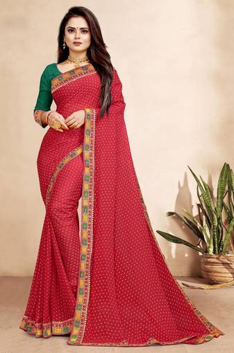rani pink color bandhni print saree with embroidered lace border sarees