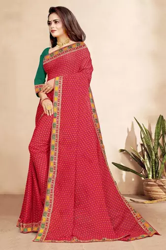 rani pink color bandhni print saree with embroidered lace border sarees