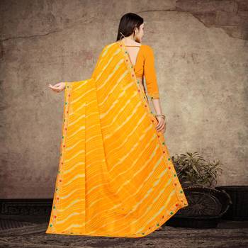 yellow color lehariya print saree with embroidered lace border sarees 4