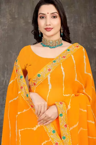 yellow color lehariya print saree with embroidered lace border sarees