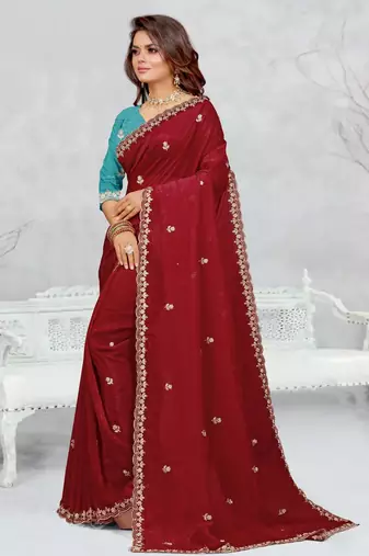 maroon color star georgette embroidered sarees