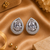 Rhodium finish crystal elegance halo earrings