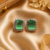 Rose gold finish parrot green luxe earrings