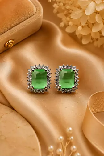 Rhodium finish forest charm studs