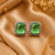 Rhodium finish forest charm studs