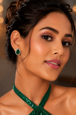 Emerald royale halo studs 1